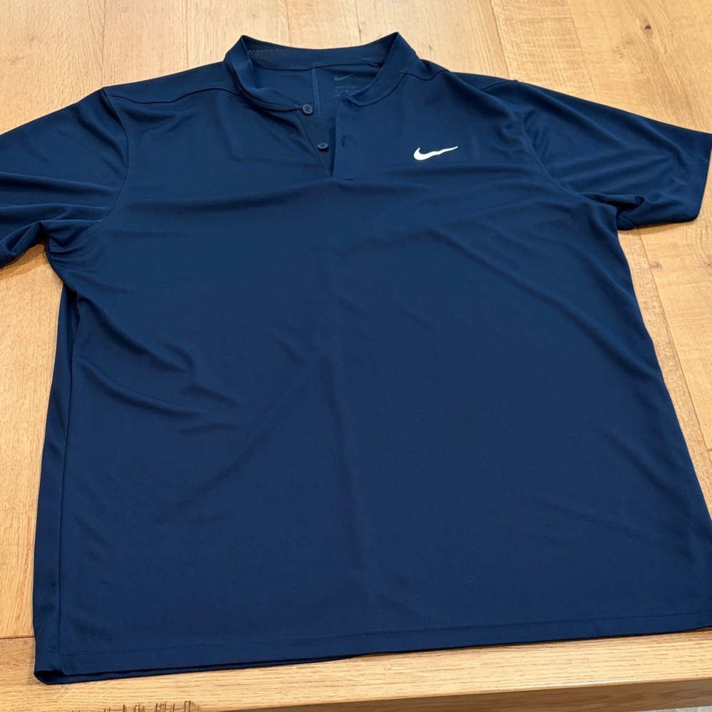 Nike Men’s Navy Blue Polo with White Swoosh
